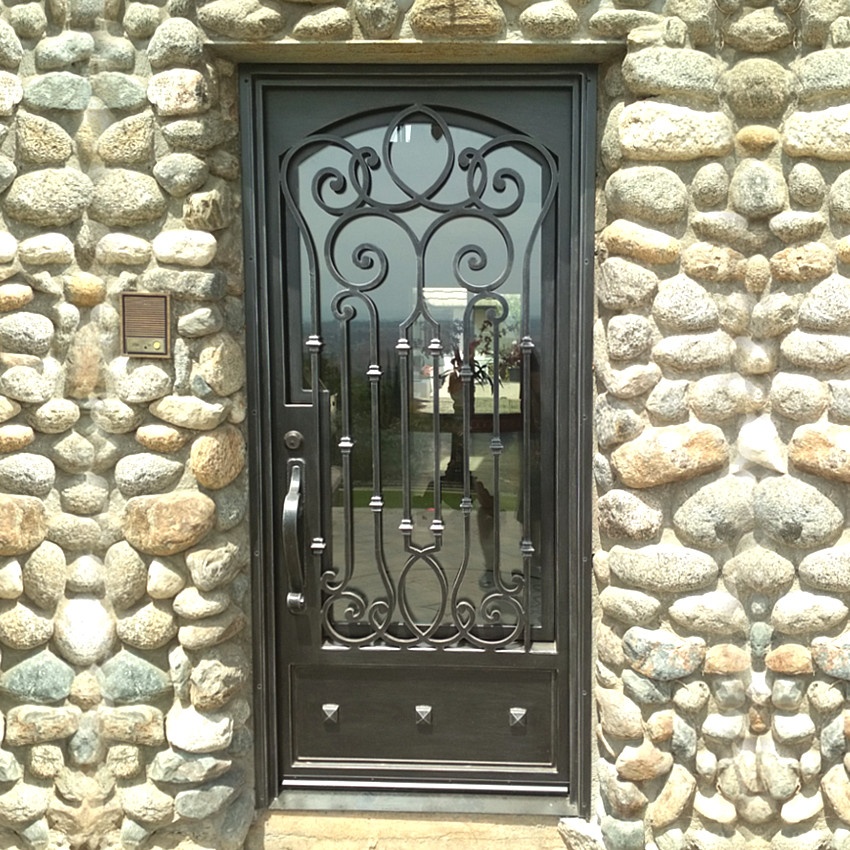 Gorgeous hand forged iron doors main entry house in Escondido CA