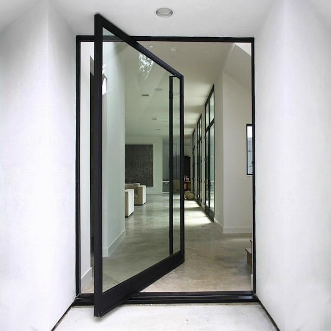  6 x 8 feet tall black framed metal front glass pivot door in Rancho Santa Fe CA